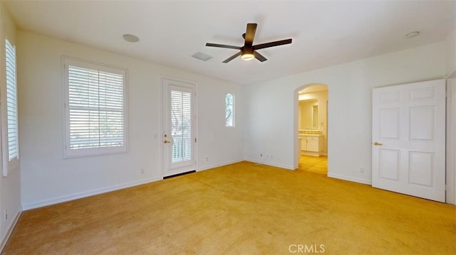 interior space featuring ceiling fan