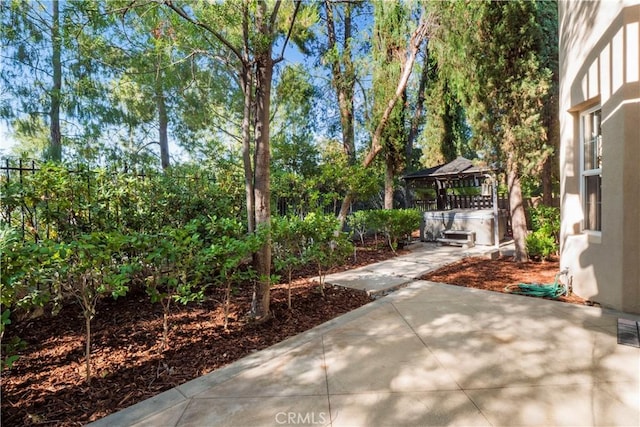 exterior space featuring a gazebo and a patio