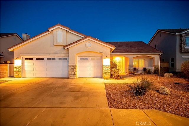 view of front of house with a garage