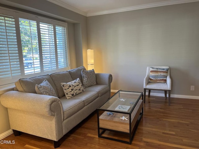 living room with dark hardwood / wood-style floors and crown molding