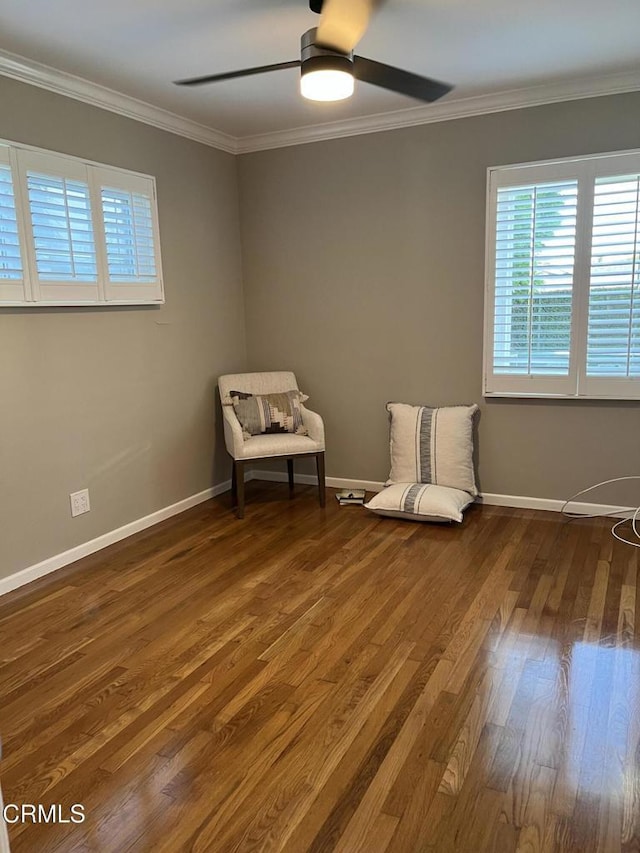 unfurnished room featuring ceiling fan, ornamental molding, and hardwood / wood-style flooring