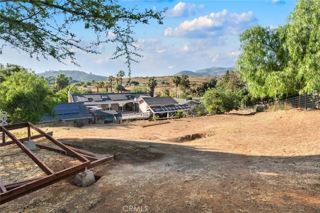 view of yard with a mountain view