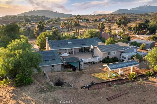 aerial view at dusk with a mountain view