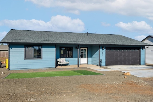 single story home with a garage