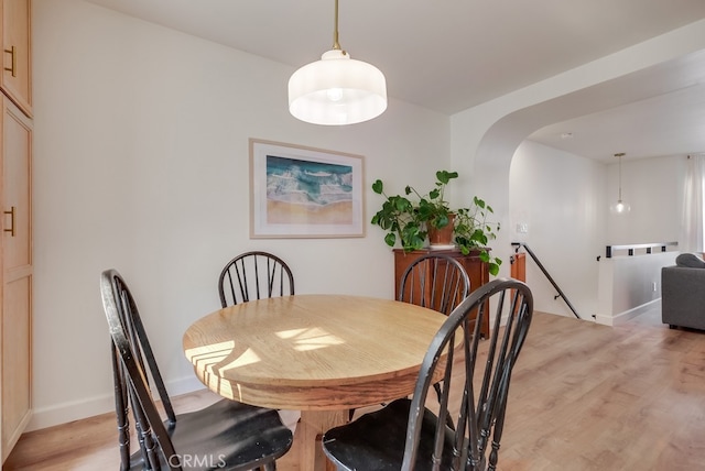 dining space featuring light hardwood / wood-style flooring