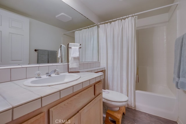 full bathroom featuring toilet, vanity, shower / tub combo, and tasteful backsplash