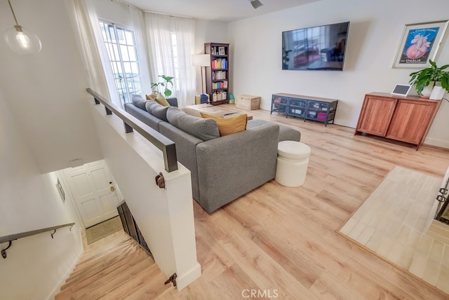 living room with light hardwood / wood-style floors