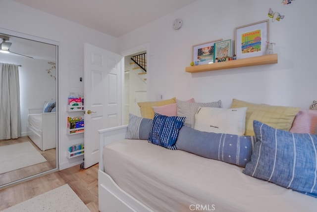 bedroom featuring a closet and light hardwood / wood-style floors