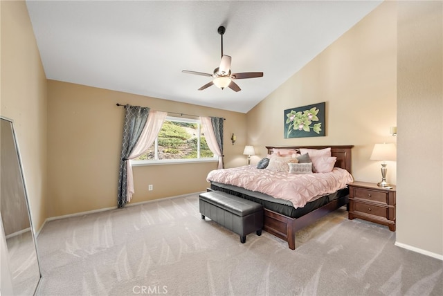 bedroom featuring a ceiling fan, lofted ceiling, light carpet, and baseboards