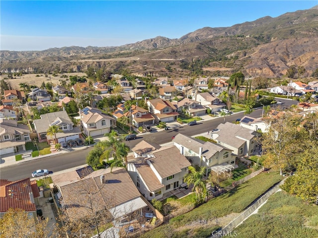 bird's eye view with a residential view and a mountain view