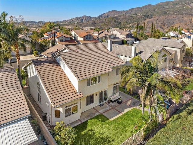 birds eye view of property featuring a residential view and a mountain view