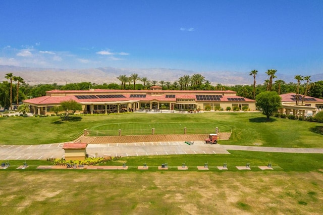 view of property's community featuring a lawn