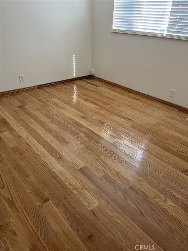 empty room featuring light hardwood / wood-style floors