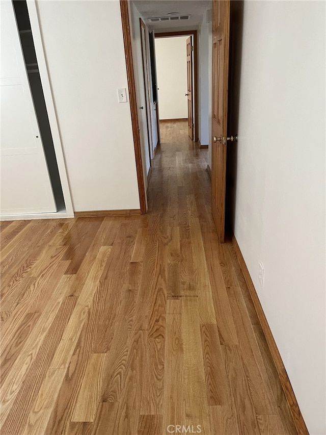 hallway featuring light hardwood / wood-style floors