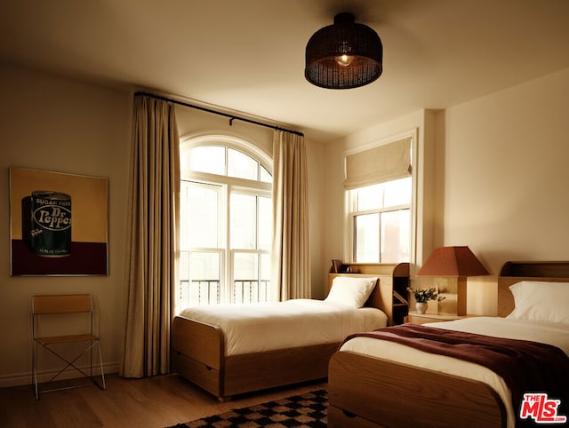 bedroom featuring hardwood / wood-style floors