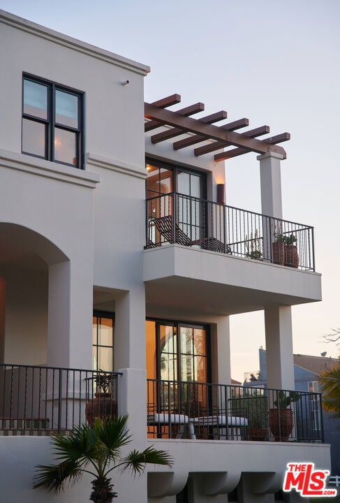 exterior space featuring a pergola