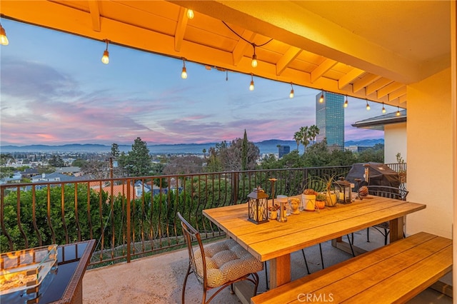 view of patio terrace at dusk