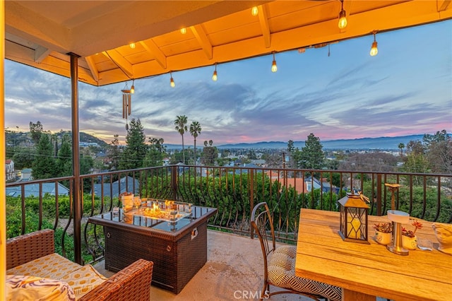 patio terrace at dusk with a balcony