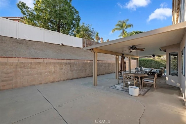 view of patio with ceiling fan