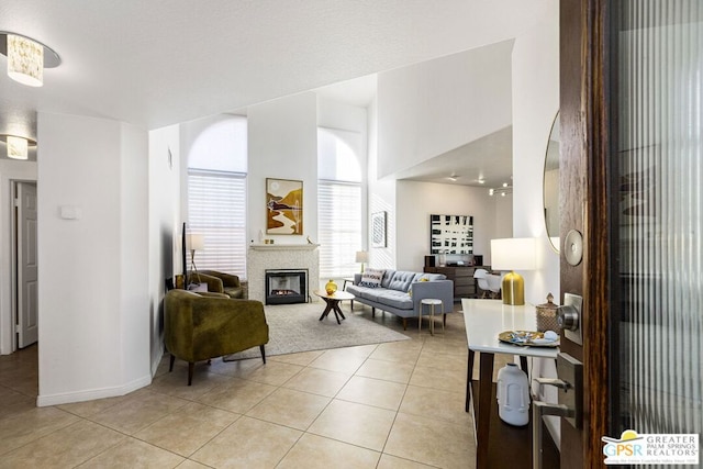 living room with light tile patterned flooring