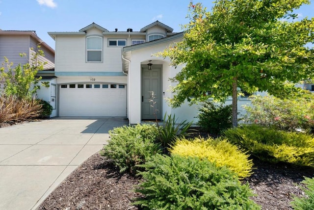 view of front of home with a garage