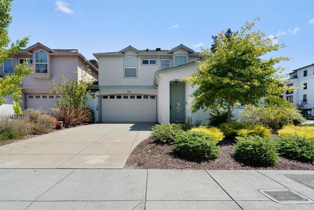 view of front of property featuring a garage