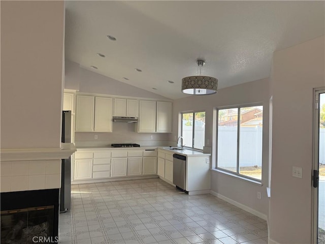 kitchen featuring white cabinets, gas cooktop, sink, and a healthy amount of sunlight