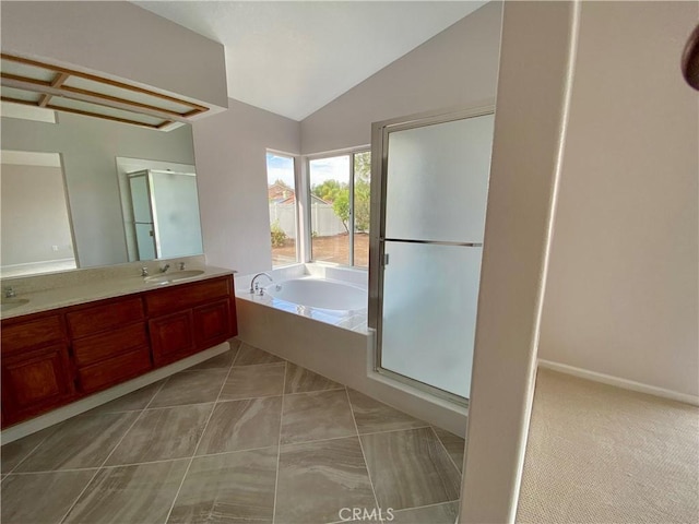 bathroom featuring vanity and shower with separate bathtub