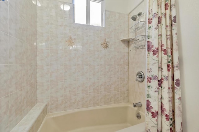 bathroom with shower / bath combo