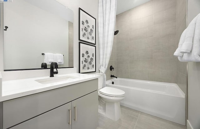 full bathroom featuring toilet, vanity, tile patterned flooring, and shower / tub combo with curtain