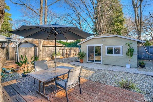 wooden deck featuring an outdoor structure