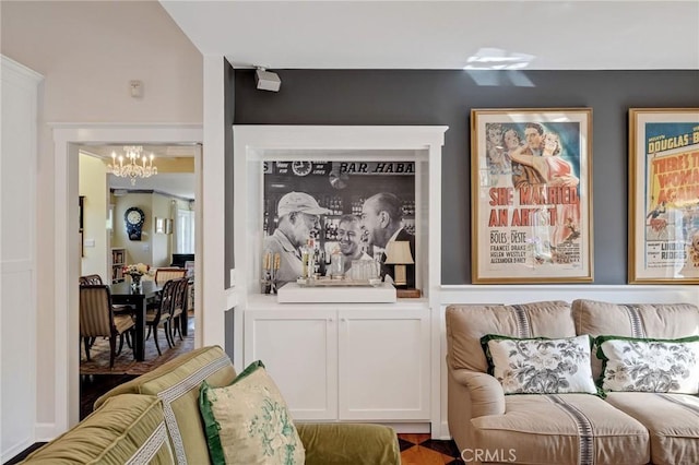 living area with a chandelier