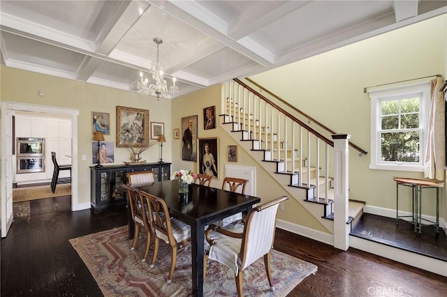 dining area featuring a chandelier, dark hardwood / wood-style flooring, beamed ceiling, and coffered ceiling