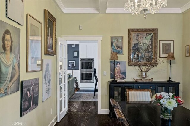 hall featuring beamed ceiling, a chandelier, and ornamental molding