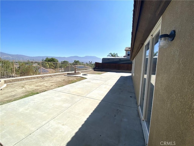 view of patio featuring a mountain view