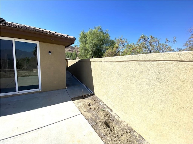 view of home's exterior featuring a patio