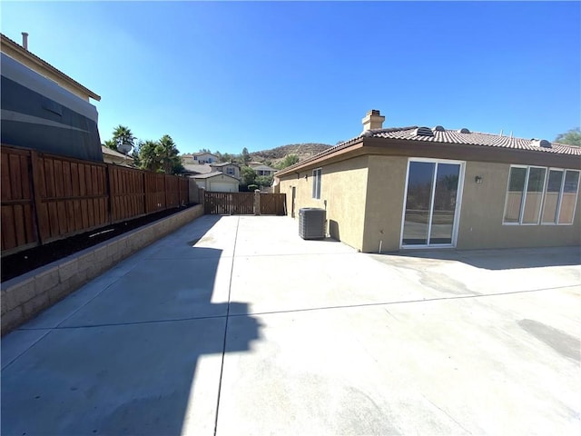 view of patio / terrace featuring cooling unit