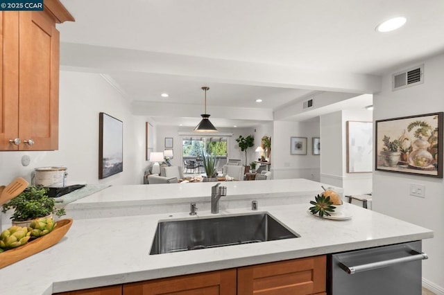 kitchen with dishwasher, sink, hanging light fixtures, light stone countertops, and ornamental molding