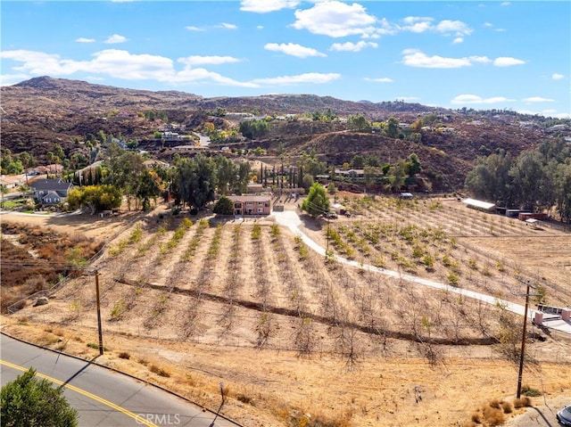 aerial view featuring a rural view and a mountain view