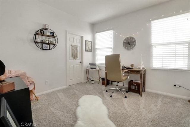 view of carpeted office space