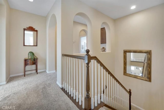 hallway with carpet