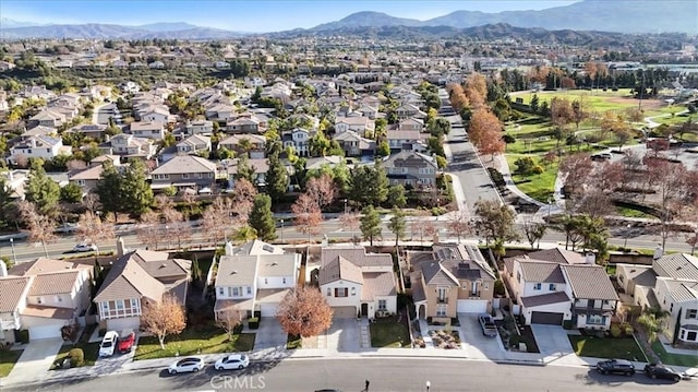 drone / aerial view featuring a mountain view