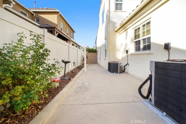 view of patio featuring central AC unit