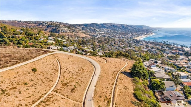 bird's eye view featuring a water and mountain view