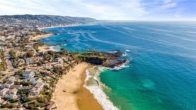 aerial view with a view of the beach and a water view