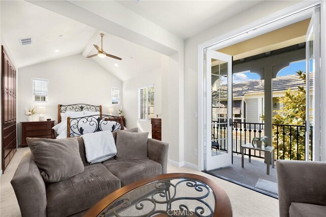 carpeted bedroom with access to exterior and lofted ceiling with beams