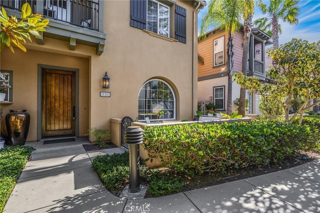 doorway to property with a balcony