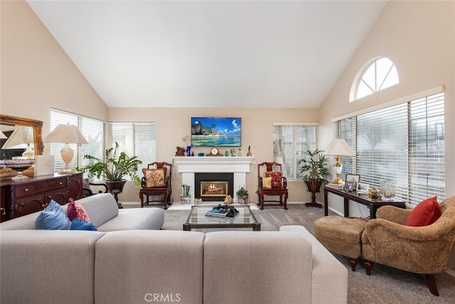 living room featuring carpet floors and high vaulted ceiling