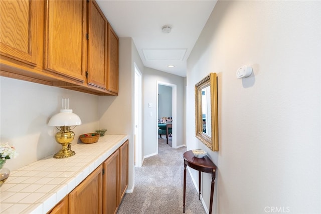 hallway featuring carpet flooring