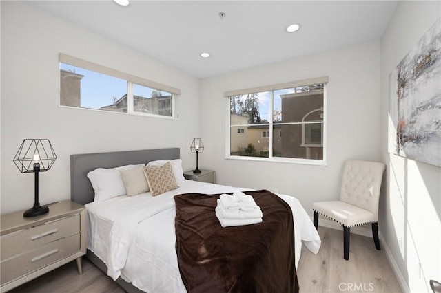 bedroom featuring hardwood / wood-style floors